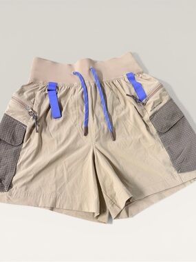 Lululemon Tan Hiking Shorts with Purple Strands.